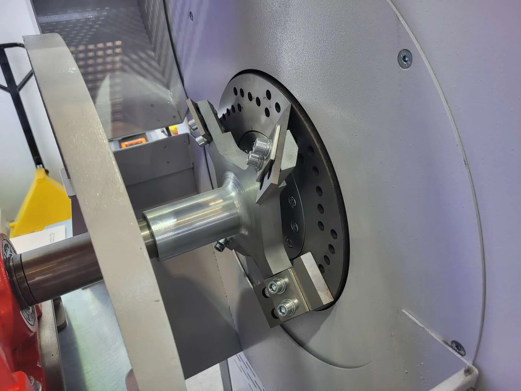Die-face cutting system with high-speed rotating blades.